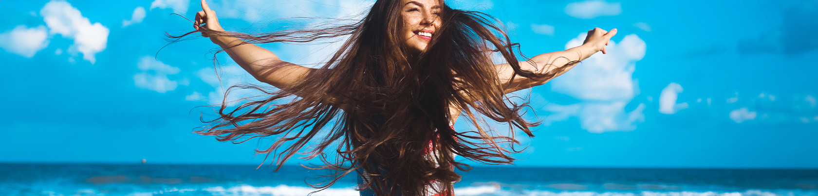 Come proteggere i capelli dal sole in estate