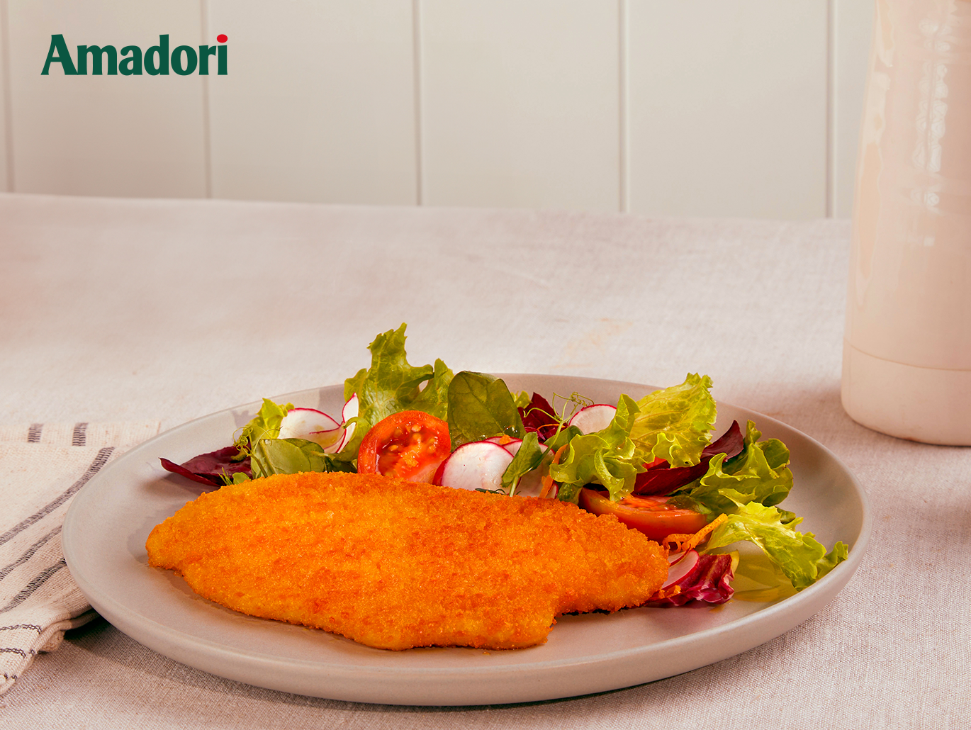 Cotoletta Sottile Amadori con insalata mista e scorza d’arancia