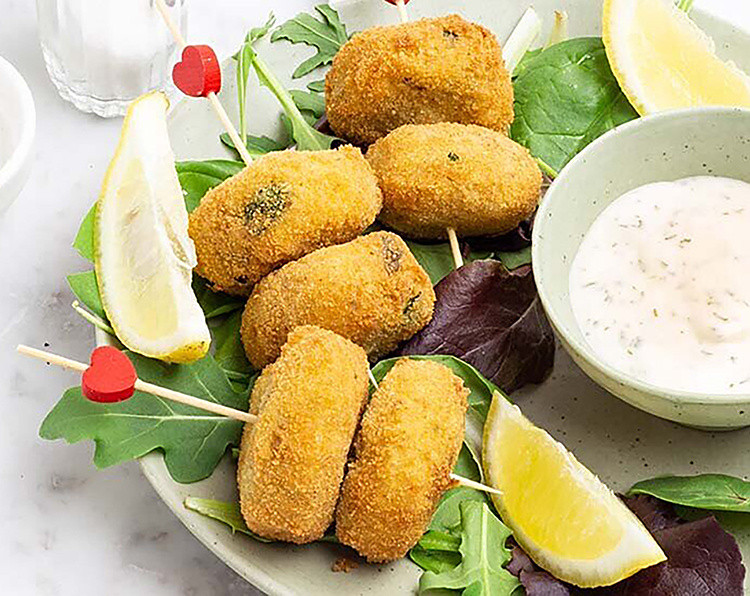 Polpette di stoccafisso norvegese con pomodori secchi e olive